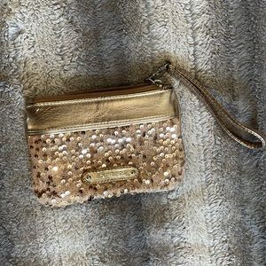 Rose gold sparkle wristlet from express. Used- light stains on inside.
